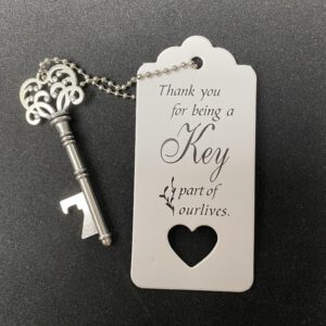 Flesopener Sleutel ( 10 stuks) Key part of ourlives. 8 x 2.6 cm