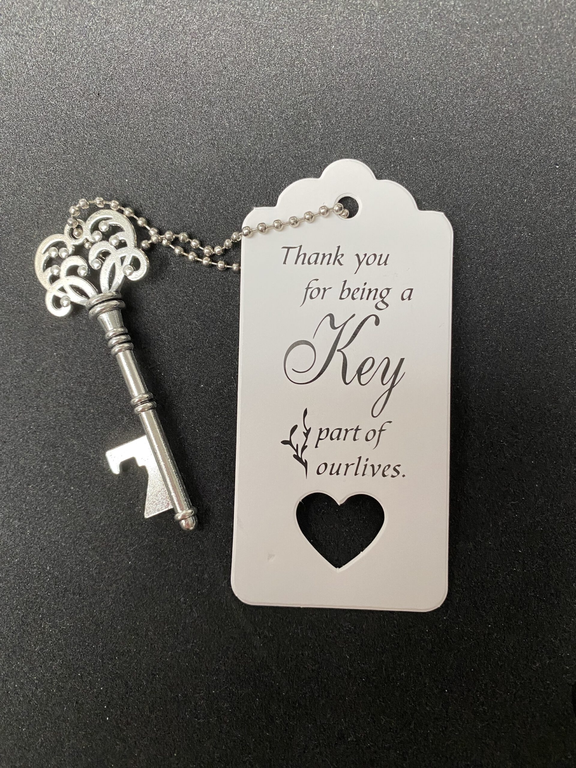 Flesopener Sleutel ( 10 stuks) Key part of ourlives. 8 x 2.6 cm