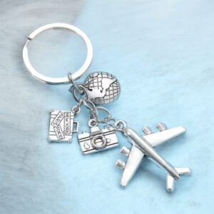 Sleutelhanger Vakantie ( Vliegtuig/Wereldbol/koffer/fototoestel ) 9 x 4 cm